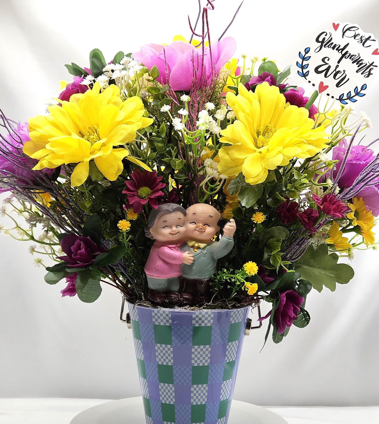 For The Special Grandma and Grandpa/Floral Design in Simple Blue Pail/Grandparents Figures at the Front of Colorful Yellow/Pink Flowers Plus