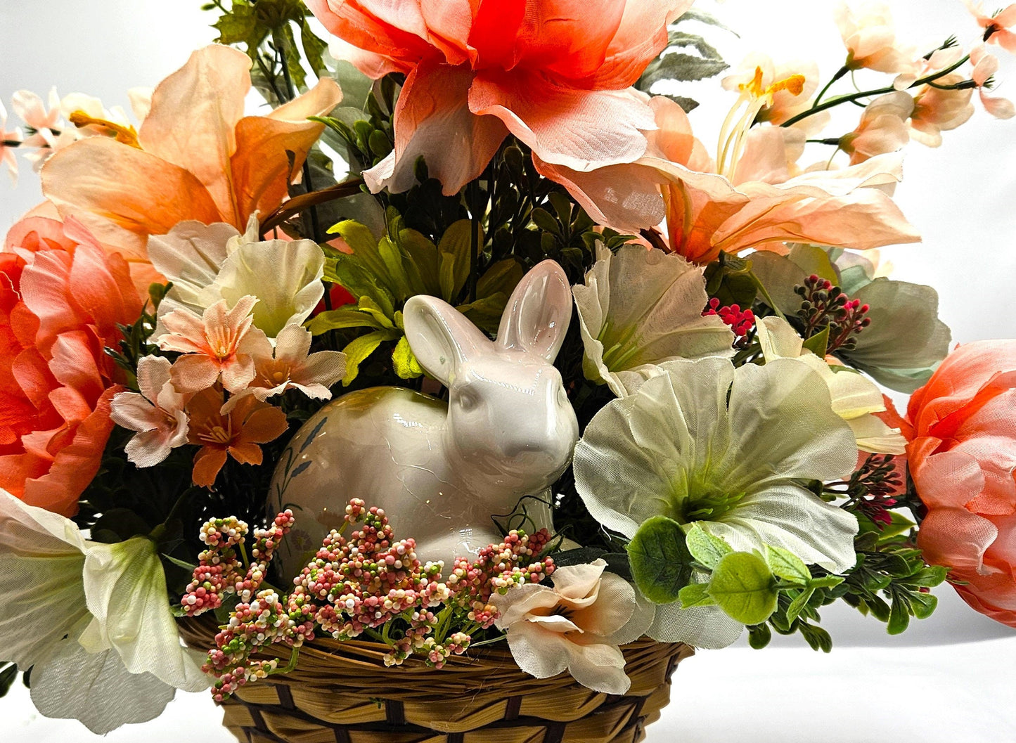 Elegant Spring Centerpiece with Bunny in Wicker Basket,  Peach and Jade Colored Peonies, Petunias and other Spring Flowers