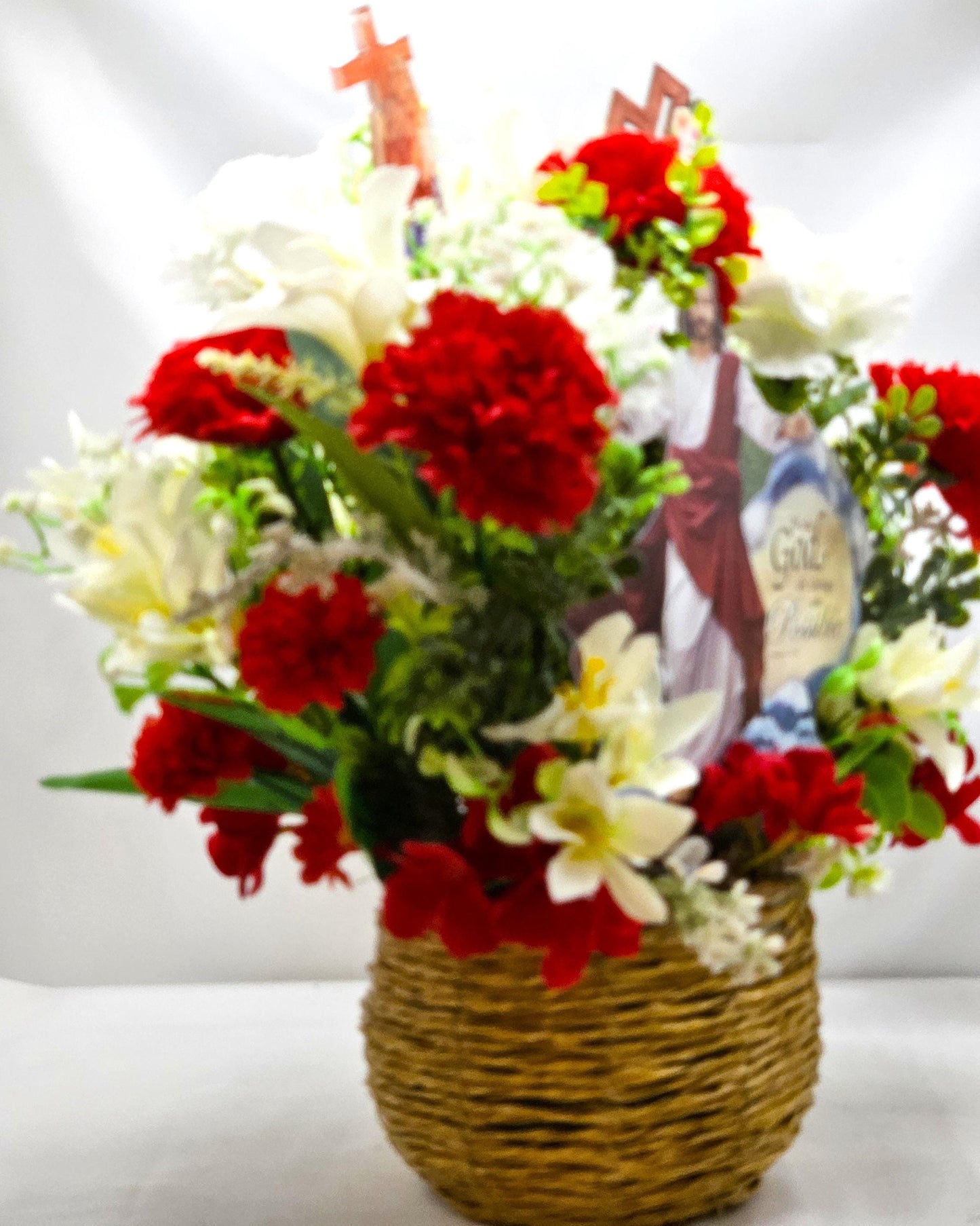 With God All Things Are Possible Flower Centerpiece Featuring Jesus Rising Within A Floral Garden of Lilies/Carnations/Added Cross Signs