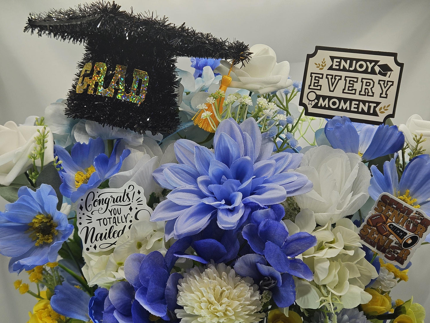 Graduation Floral Centerpiece/Blue Wood Basket/Blue/White/Yellow Flowers/Graduation Hat/Congratulations Messages/Roses/Dahlias/Pansies Plus