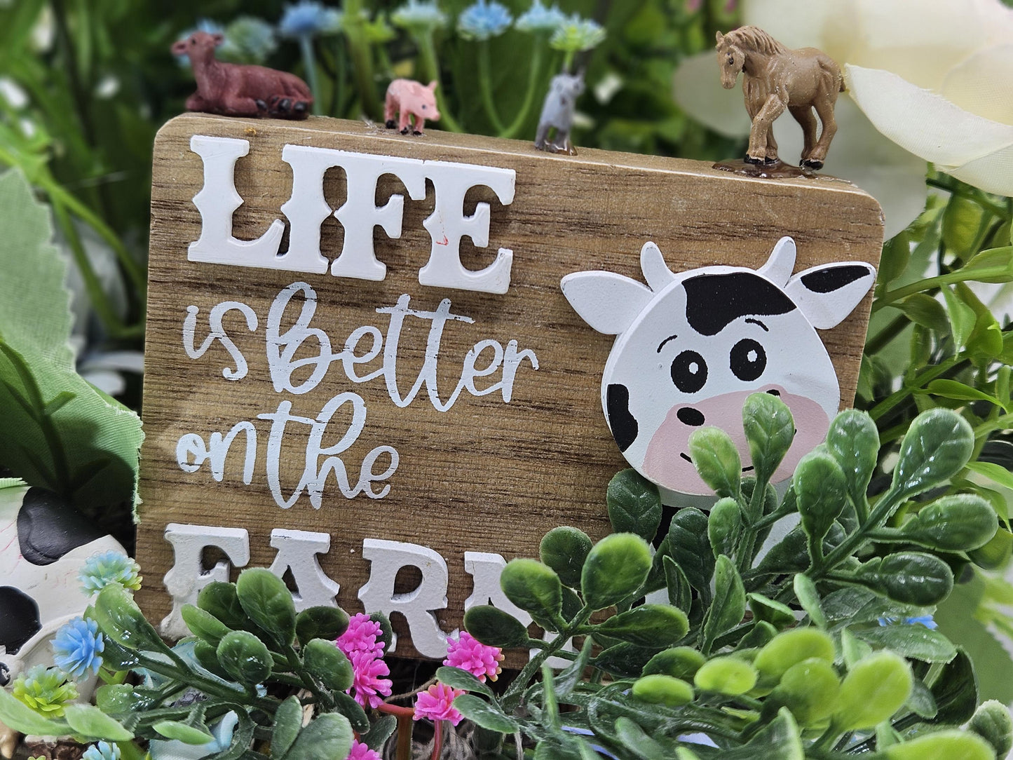 Life is Better on the Farm Floral Centerpiece w/Country Cow, Curious Sign and Various Farm Farm Animals Amidst Ranunculus/Other Flowers