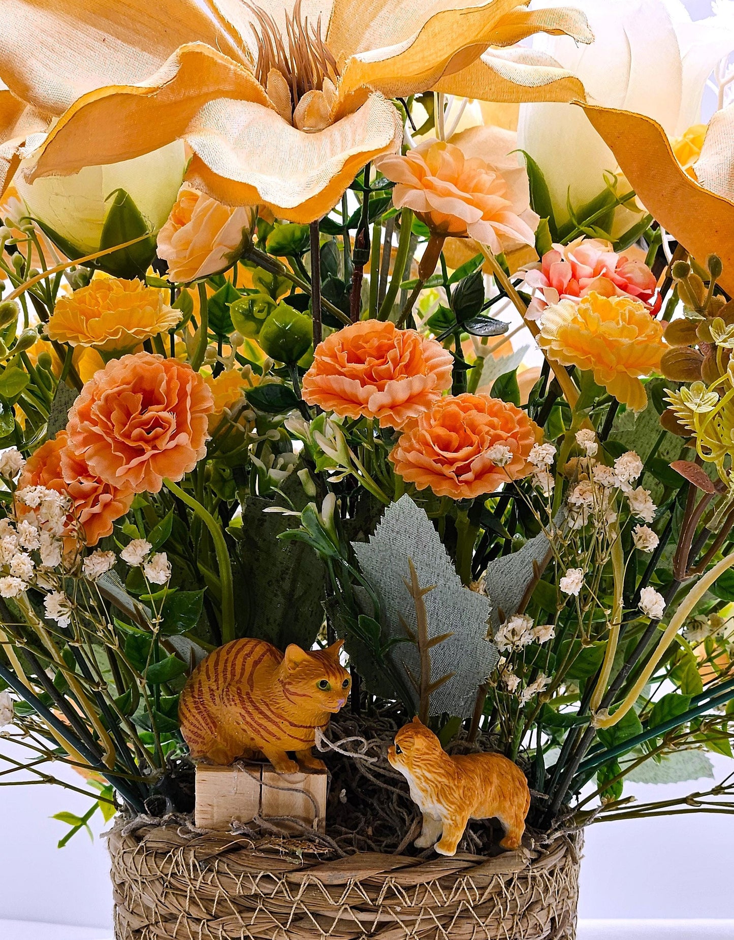 A Purr-fectly Stunning Floral Arrangement w/2 Tabby Tan Cats at the Front of Tan Magnolias/White Roses/Other Florals/Baby's Breath