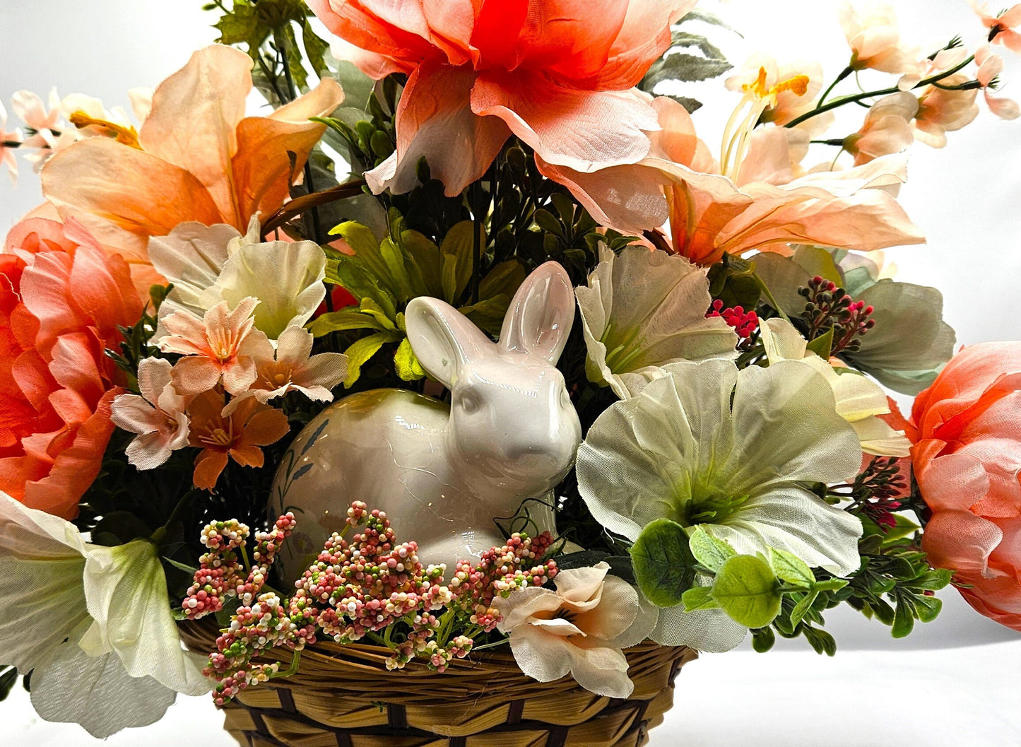 Elegant Spring Centerpiece with Bunny in Wicker Basket,  Peach and Jade Colored Peonies, Petunias and other Spring Flowers