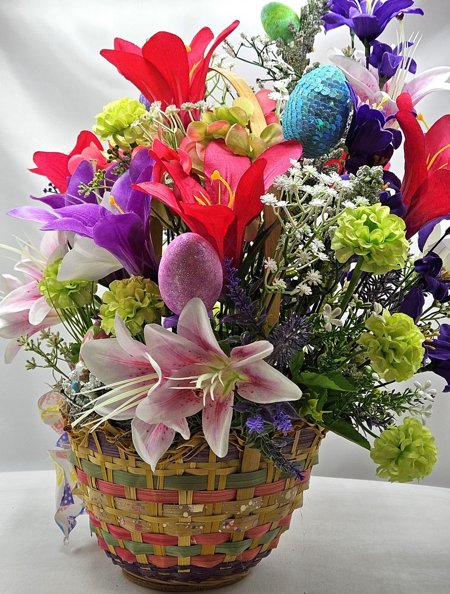 Exquisite Multi-Colored Scalloped Easter Basket w/Lovely Glittery Bow/A Variety of Lilies in Basket/Rabbit Pushing Cart/Other Easter Accents