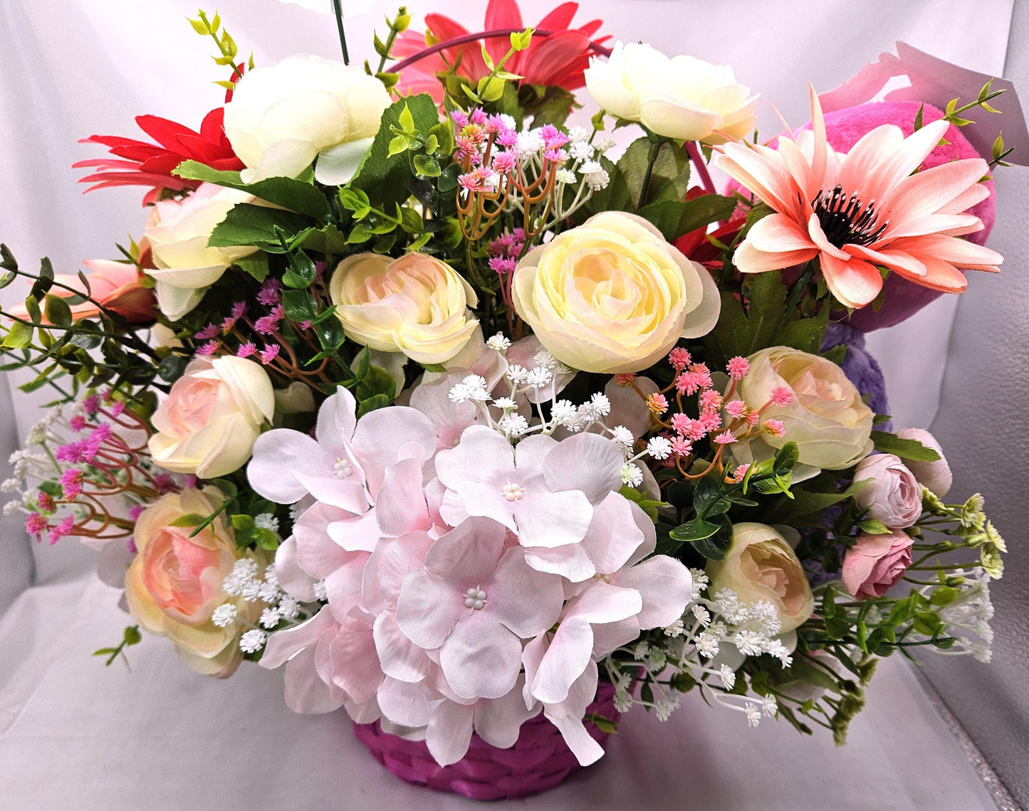 Turtle Lover Graduation Centerpiece/Whimsical Stuffed Pastel Turtle/Pink Wicker Basket/Ranunculus/Roses/Hydrangea/Pinks/White/Congrat Notes