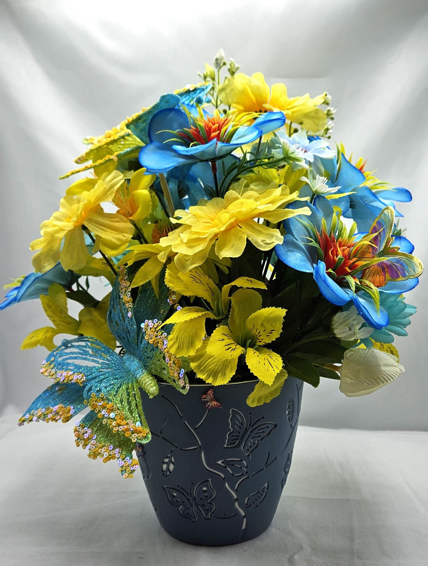 Butterfly Flower Arrangement, Sparkling Butterflies and Florals in Decorated Butterfly Pot, Yellow/Teal Blue Flowers & Butterfly Accents
