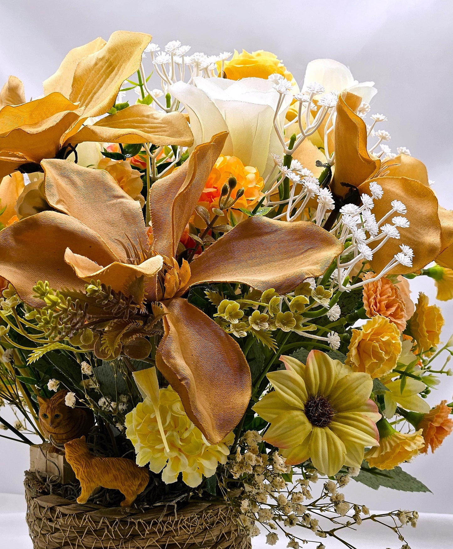 A Purr-fectly Stunning Floral Arrangement w/2 Tabby Tan Cats at the Front of Tan Magnolias/White Roses/Other Florals/Baby's Breath