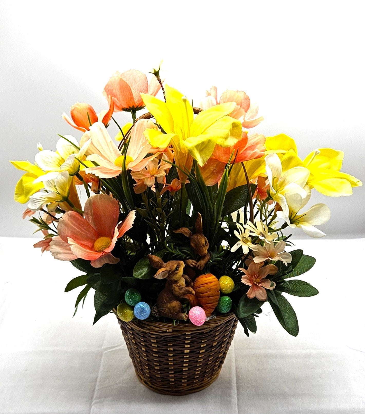 Charming Spring/Summer Flower Arrangement in Wicker Basket with Ceramic Bunnies with Carrot, Glitter, Pastel Flowers