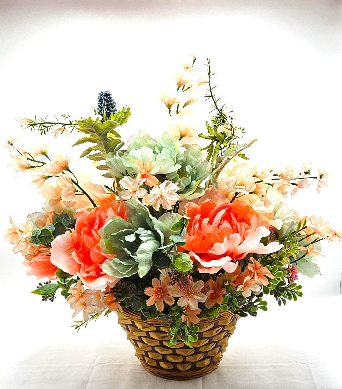 Elegant Spring Centerpiece with Bunny in Wicker Basket,  Peach and Jade Colored Peonies, Petunias and other Spring Flowers