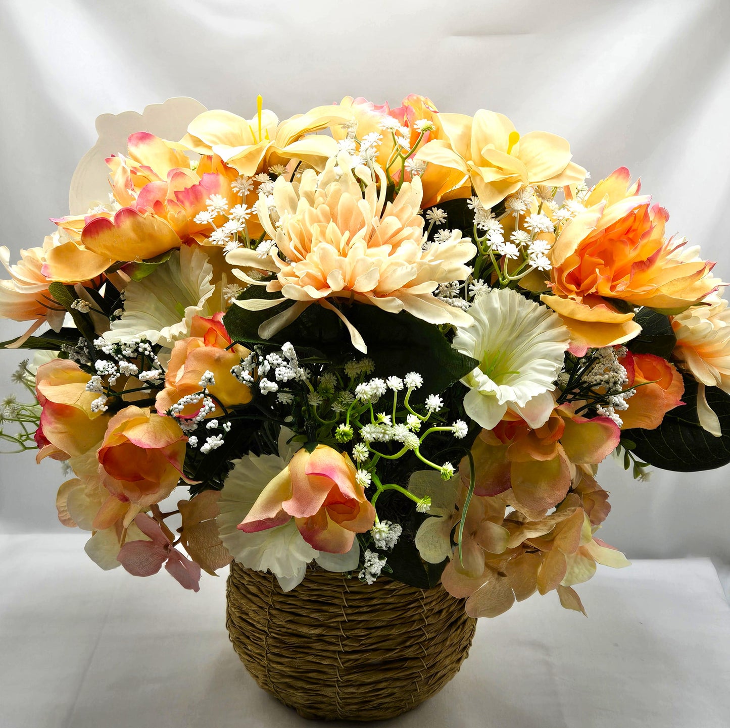 Family of Four Ceramic Figures Amidst Peach/White Flowers in Elegant Round Wicker Basket, Baby's Breath/Greenery/Mother's Day Sign