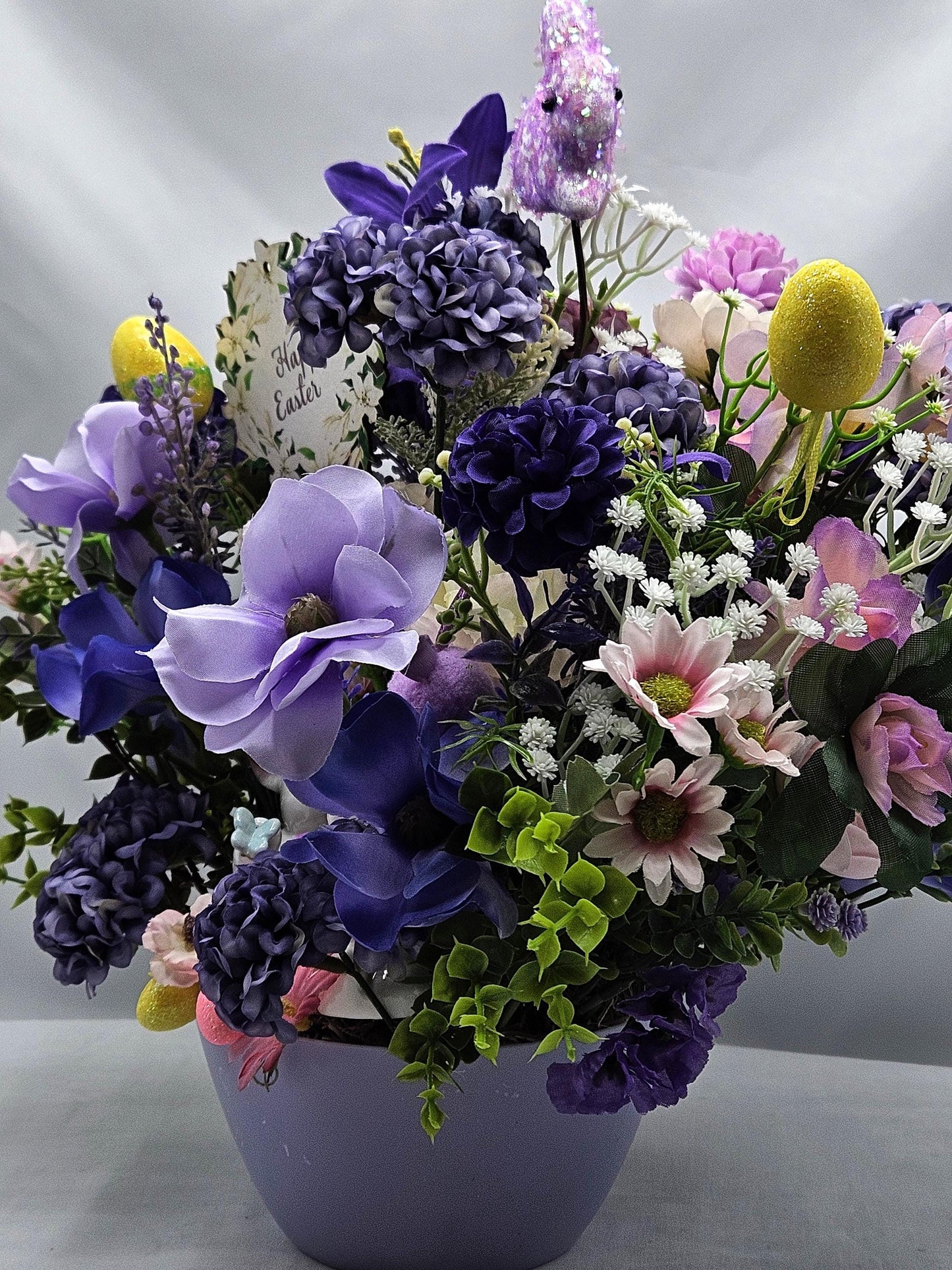 Easter/Spring Flower Arrangement/Purples/Lilac Flowers/Greenery/Cute Bunny Couple/Glittery Eggs/Happy Easter Sign/Easter Accens/Lilac Dish