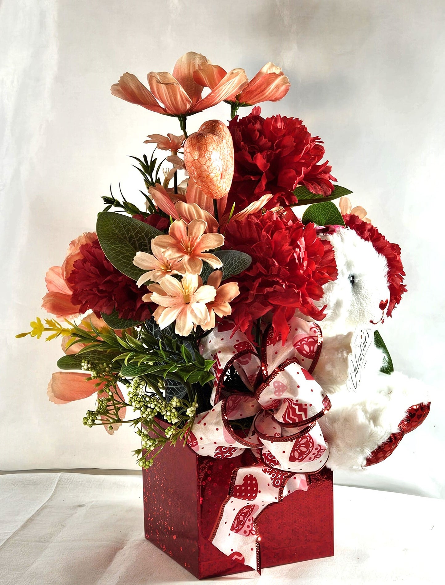 Romantic Flower Arrangement with White Bear Set in Red Gift Box - Red Carnations, Peach/White Florals, Glitter Hearts, and a Beautiful Bow"