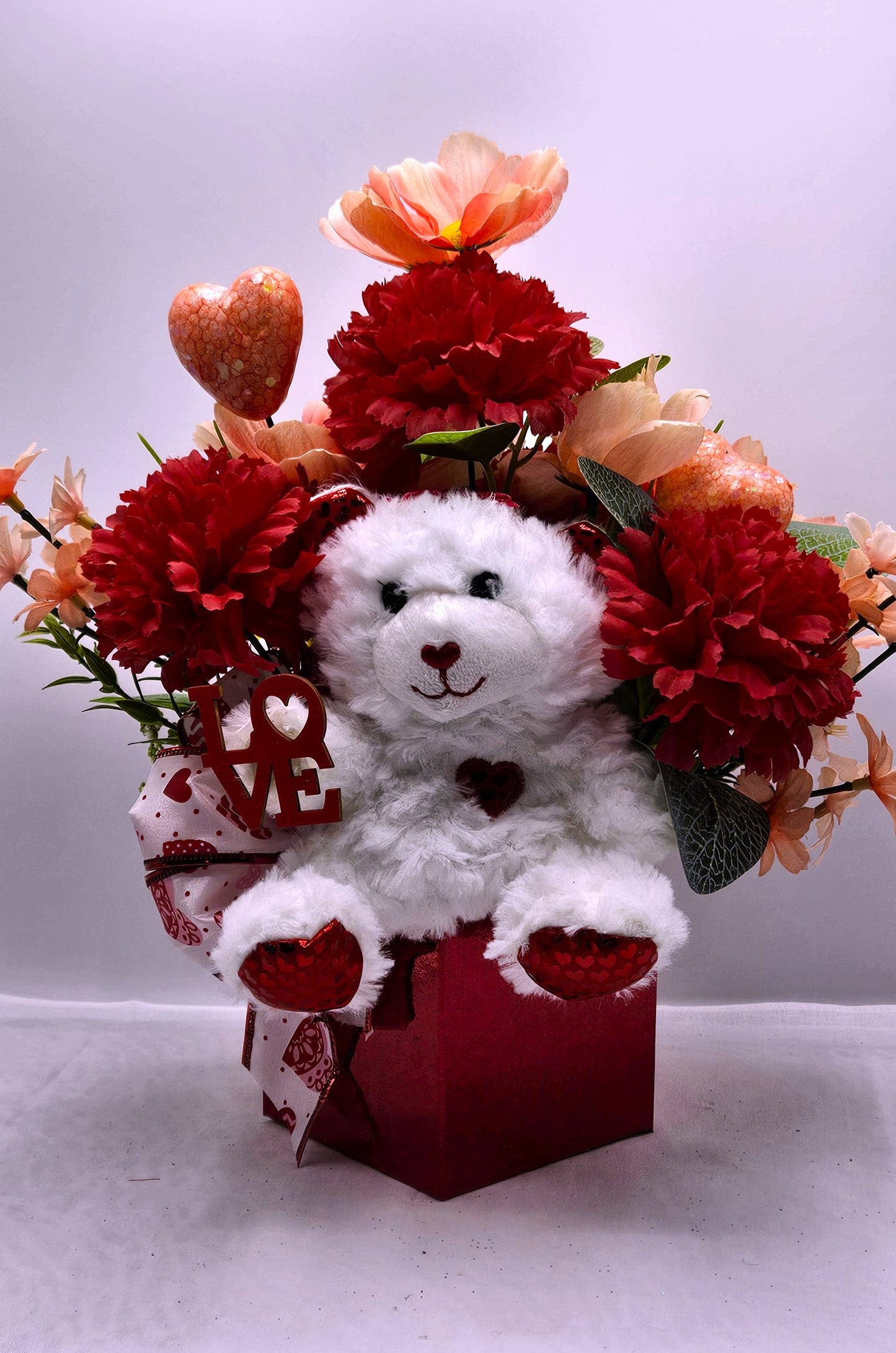 Romantic Flower Arrangement with White Bear Set in Red Gift Box - Red Carnations, Peach/White Florals, Glitter Hearts, and a Beautiful Bow"