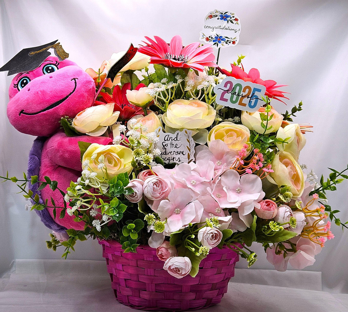 Turtle Lover Graduation Centerpiece/Whimsical Stuffed Pastel Turtle/Pink Wicker Basket/Ranunculus/Roses/Hydrangea/Pinks/White/Congrat Notes