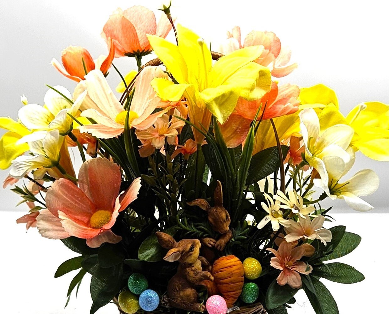 Charming Spring/Summer Flower Arrangement in Wicker Basket with Ceramic Bunnies with Carrot, Glitter, Pastel Flowers