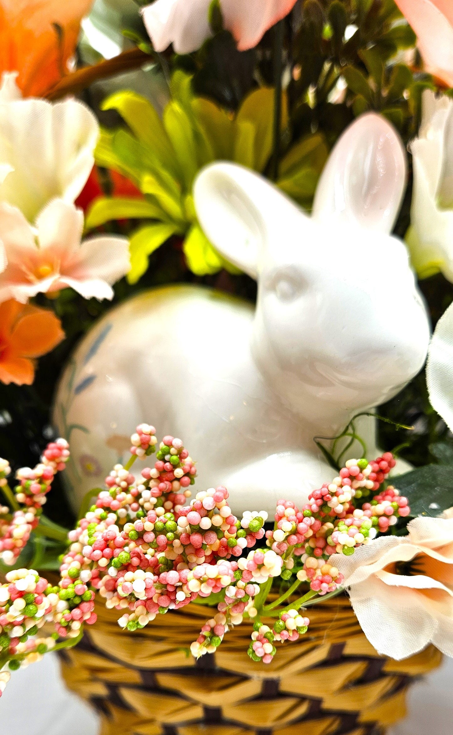 Elegant Spring Centerpiece with Bunny in Wicker Basket,  Peach and Jade Colored Peonies, Petunias and other Spring Flowers