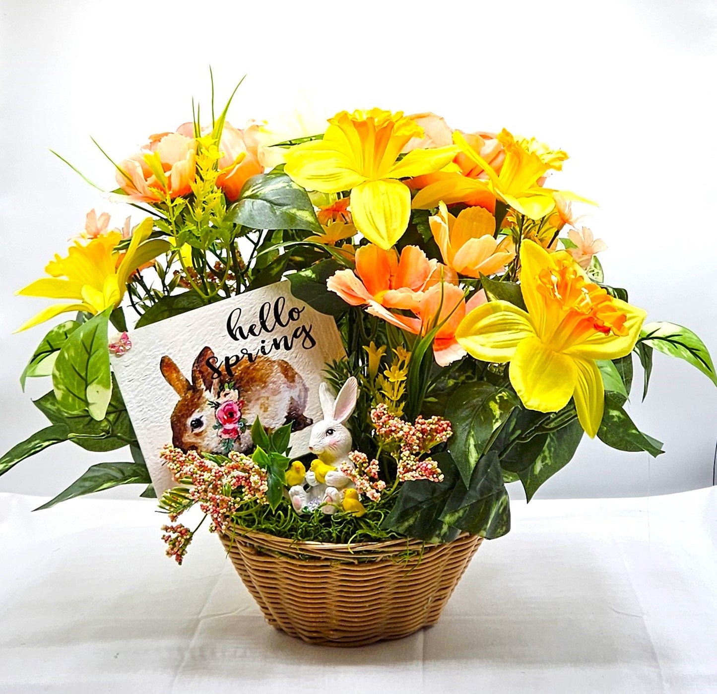 Hello Spring Flower Arrangement Featuring Cute Bunnies Amidst Daffodils, Cosmos, Peonies and Other Spring Flowers and Greenery