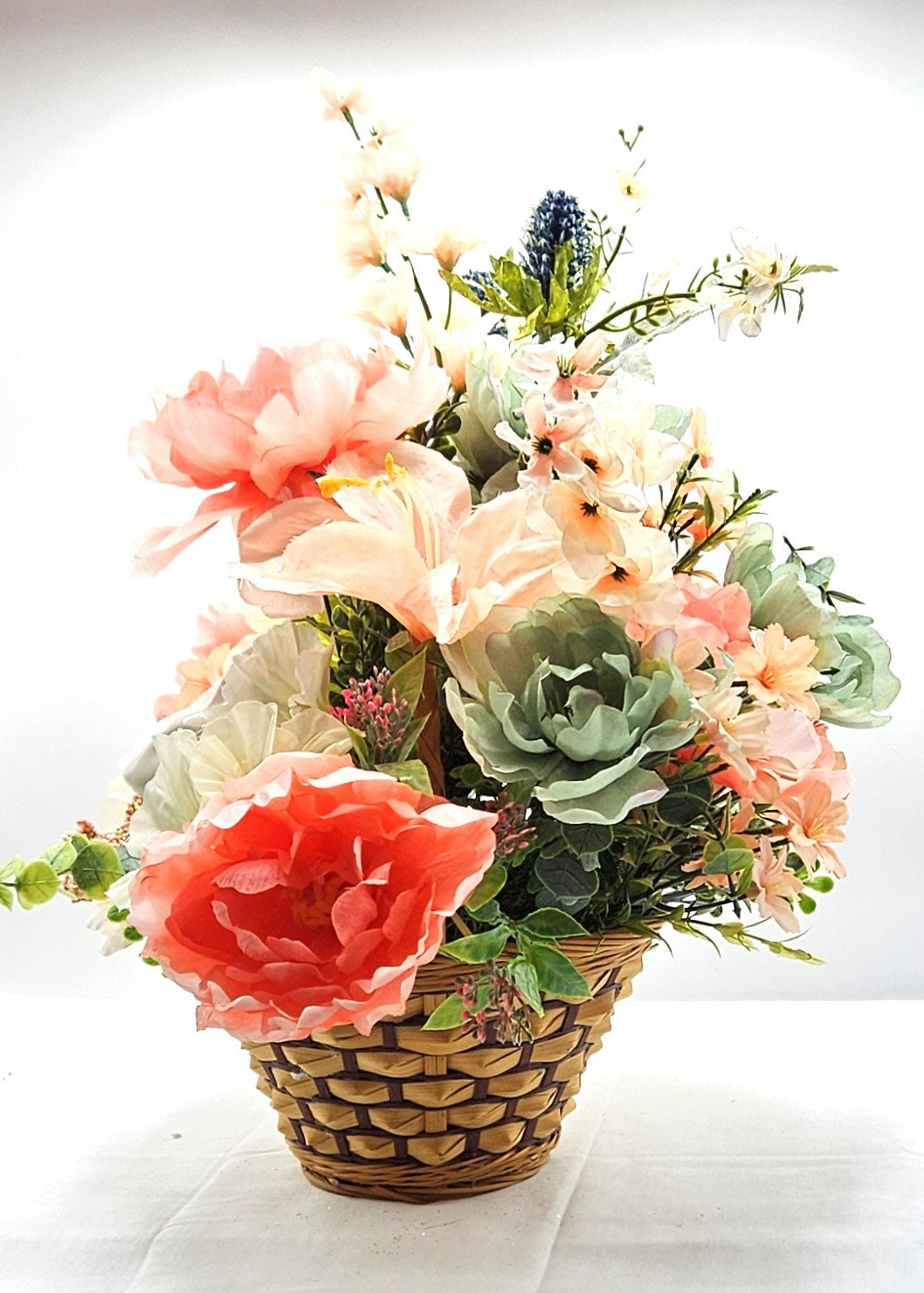 Elegant Spring Centerpiece with Bunny in Wicker Basket,  Peach and Jade Colored Peonies, Petunias and other Spring Flowers