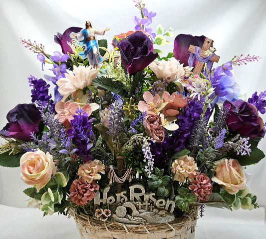 He is Risen Easter Floral/Decor/Gift in Off-White Basket with Somber Colored Roses/Carnations/Mums/Other Flowers/Greens/Jesus/Cross Signs