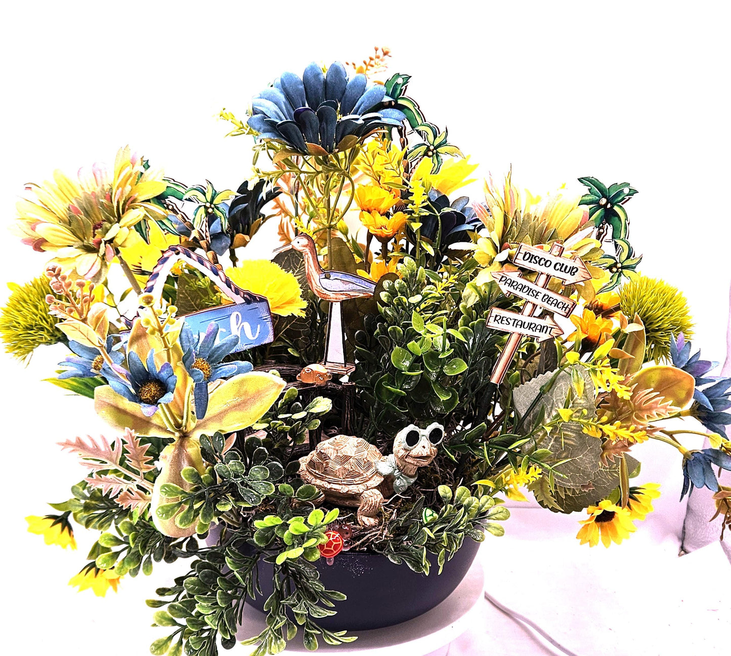 Fun in the Sun Turtle Mania Tropical Flower Arrangement/Turtle in Sunglasses in garden of Teal/Yellow/Green Flowers/Greenery/Bridge