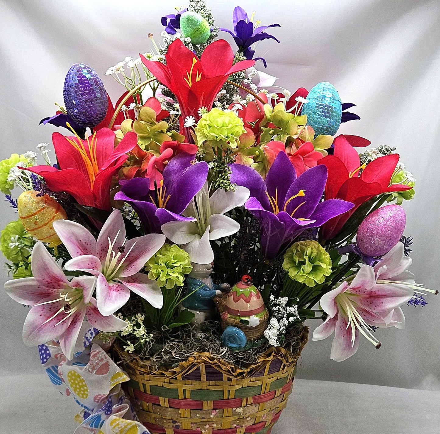 Exquisite Multi-Colored Scalloped Easter Basket w/Lovely Glittery Bow/A Variety of Lilies in Basket/Rabbit Pushing Cart/Other Easter Accents