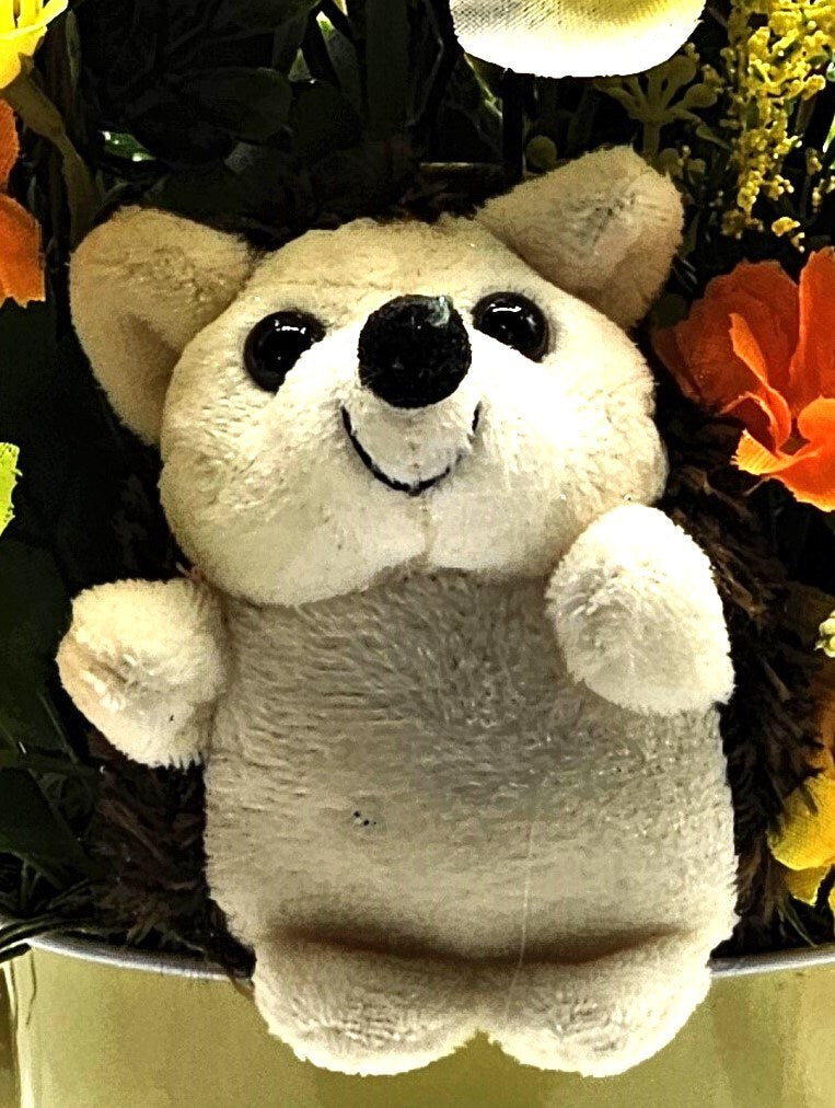 Cute Hedgehogs in a Bright, Vivid Cheerful Yellow floral Garden, A Plush Hedgehog Plus Smaller ones Scattered Throughout the Floral Piece
