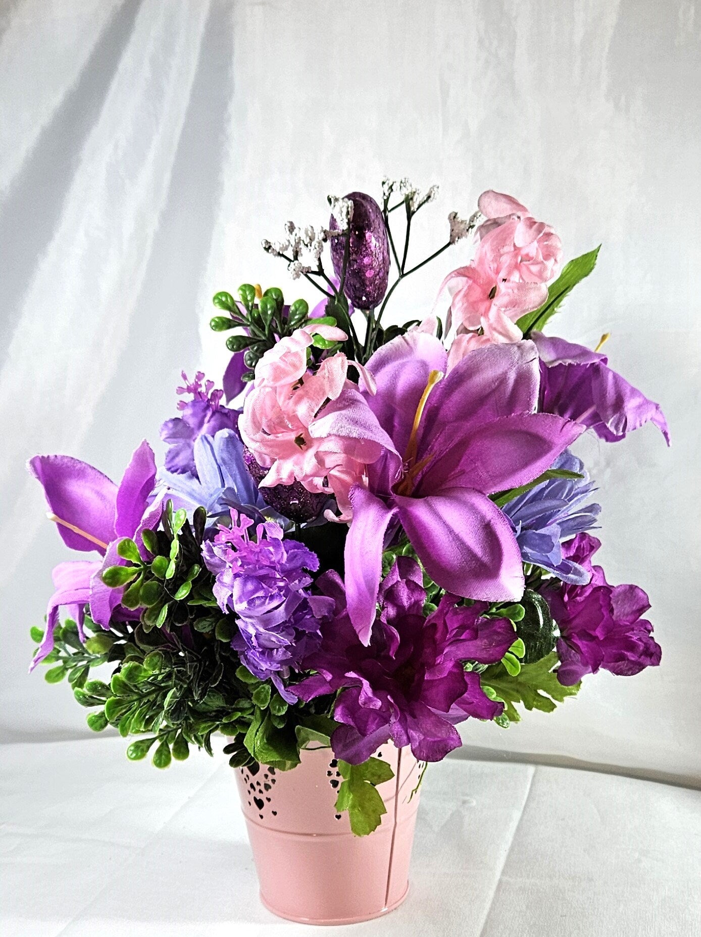 Heartwarming Flower Arrangement with a Kissing Couple Among Blue, Lilac, and Pink Florals Plus Sparkly Hearts