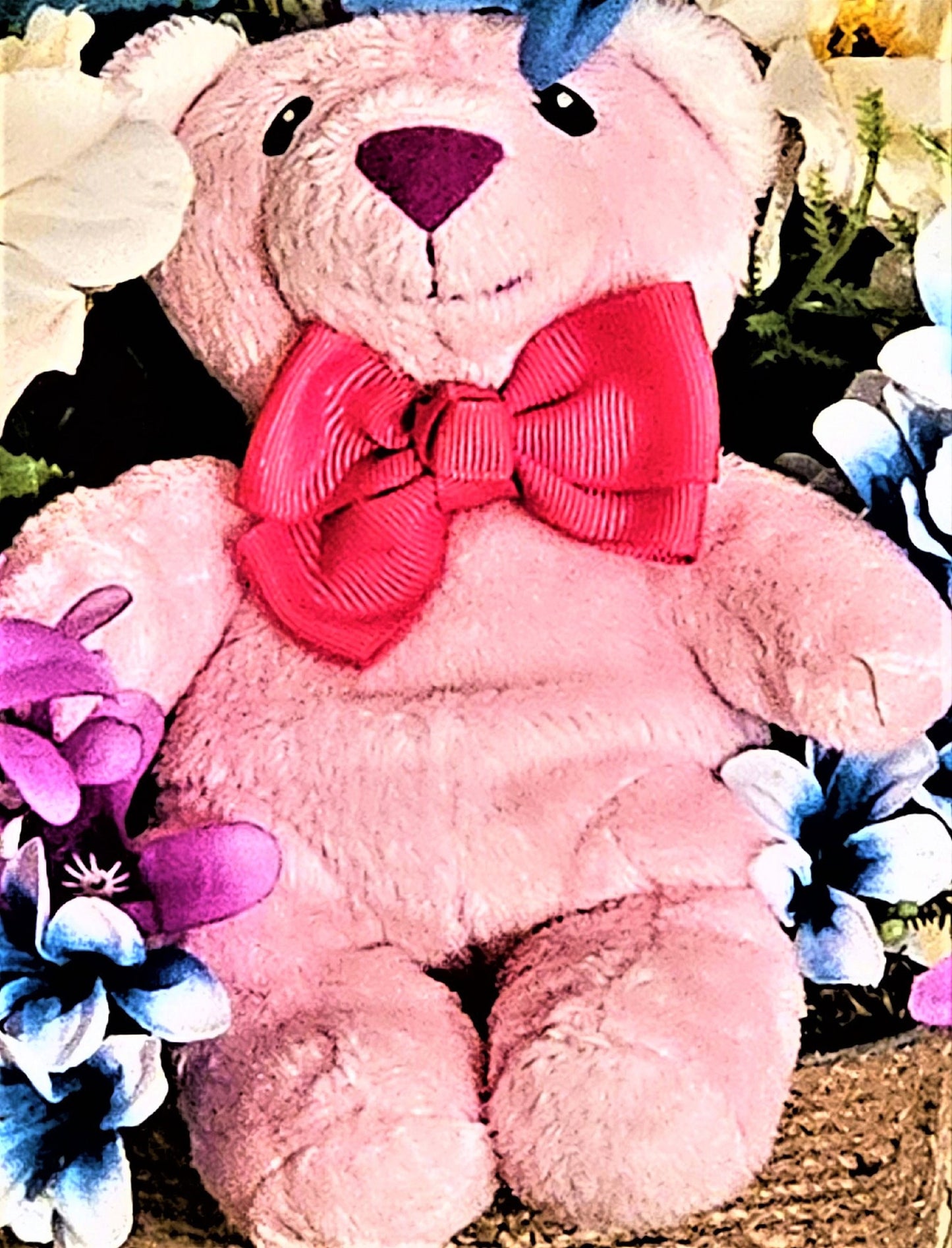 Artificial Flower Arrangement with Teddy Bear Sitting in a Bucket