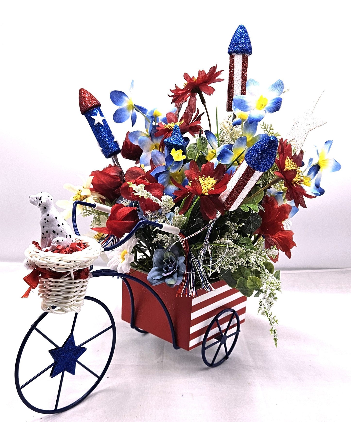 Americana Flower Arrangement Set in Bicycle Container with Red/White/Blue Flowers, sparkly Firecrackers and Stars, Basket with Dalmatian Dog