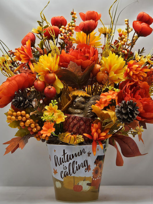 Autumn Is Calling Flower Arrangement/Cute Ceramic Squirrel Amidst Burnt Orange/Yellow Fall Flowers/Pine Cones/Berries/Wheat/Fall Grasses