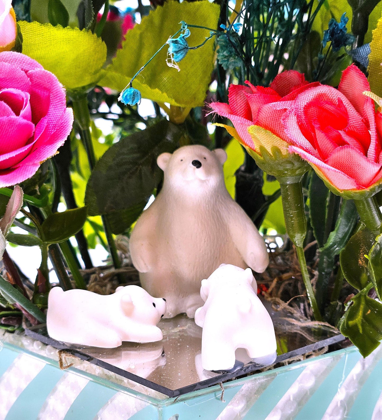A Chilling Polar Bear Foral Centerpiece Set in Teal Striped Plastic Pot, Teal/Aqua/Pink Roses, Carnations/Other FloralsBaby's Breath