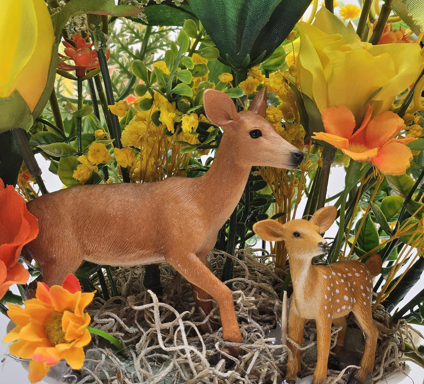 Momma and baby deer frolicking in a floral garden of yellow and orange Lilies, Pansies, Roses/other Florals, Greenery/Baby's Breath/Gifting