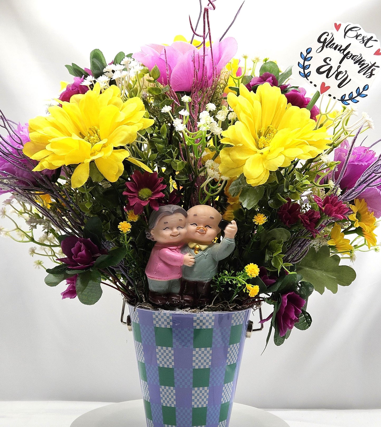 For The Special Grandma and Grandpa/Floral Design in Simple Blue Pail/Grandparents Figures at the Front of Colorful Yellow/Pink Flowers Plus