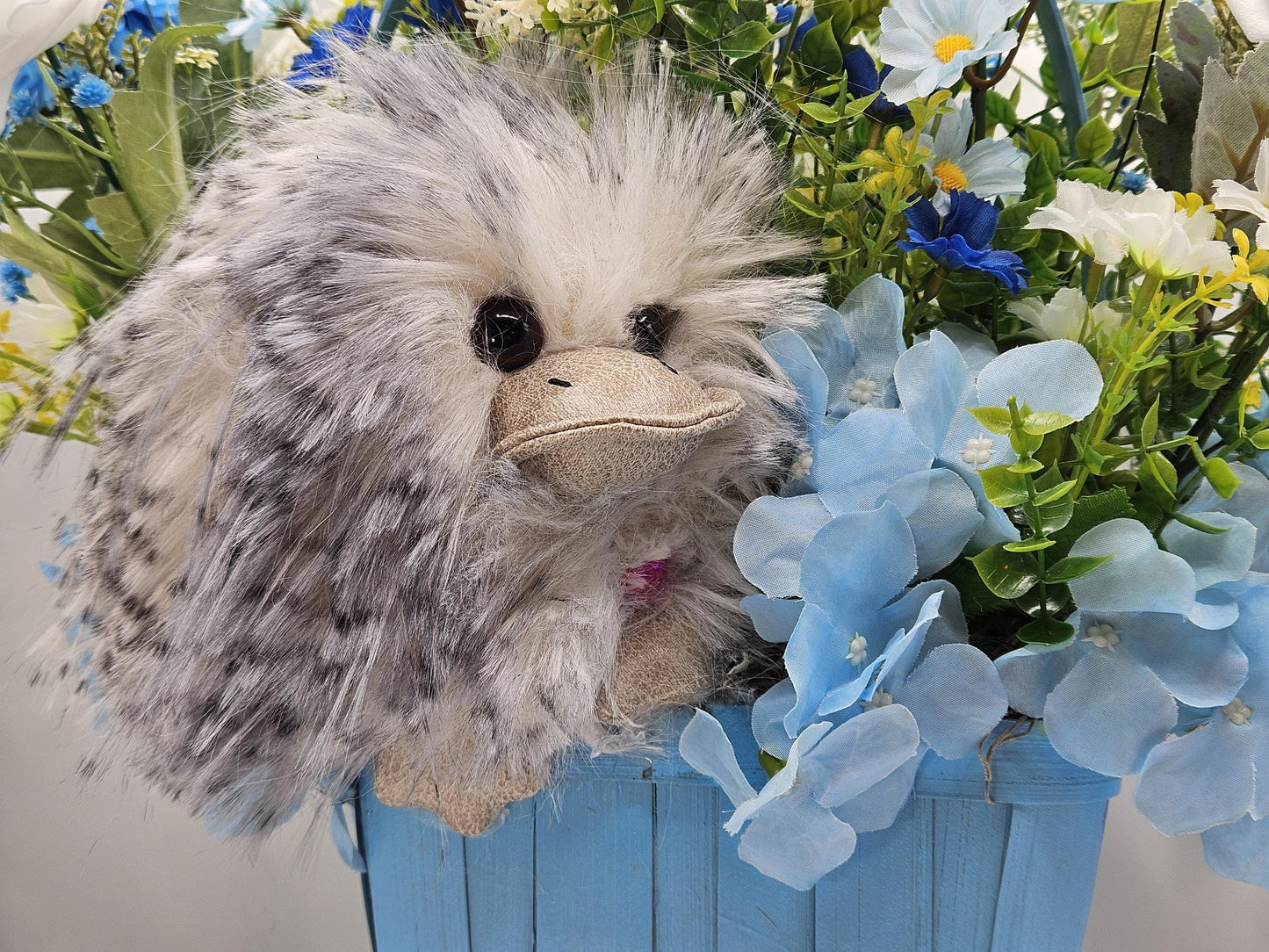 Elegant Silk-type Graduation Florals/Greenery with Unique Fuzzy Owl/Hedgehog/Platypus Accents/Wood Baskets/Blues/Yellow/Green Flowers