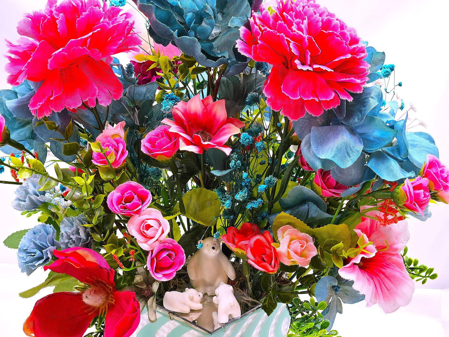 A Chilling Polar Bear Foral Centerpiece Set in Teal Striped Plastic Pot, Teal/Aqua/Pink Roses, Carnations/Other FloralsBaby's Breath