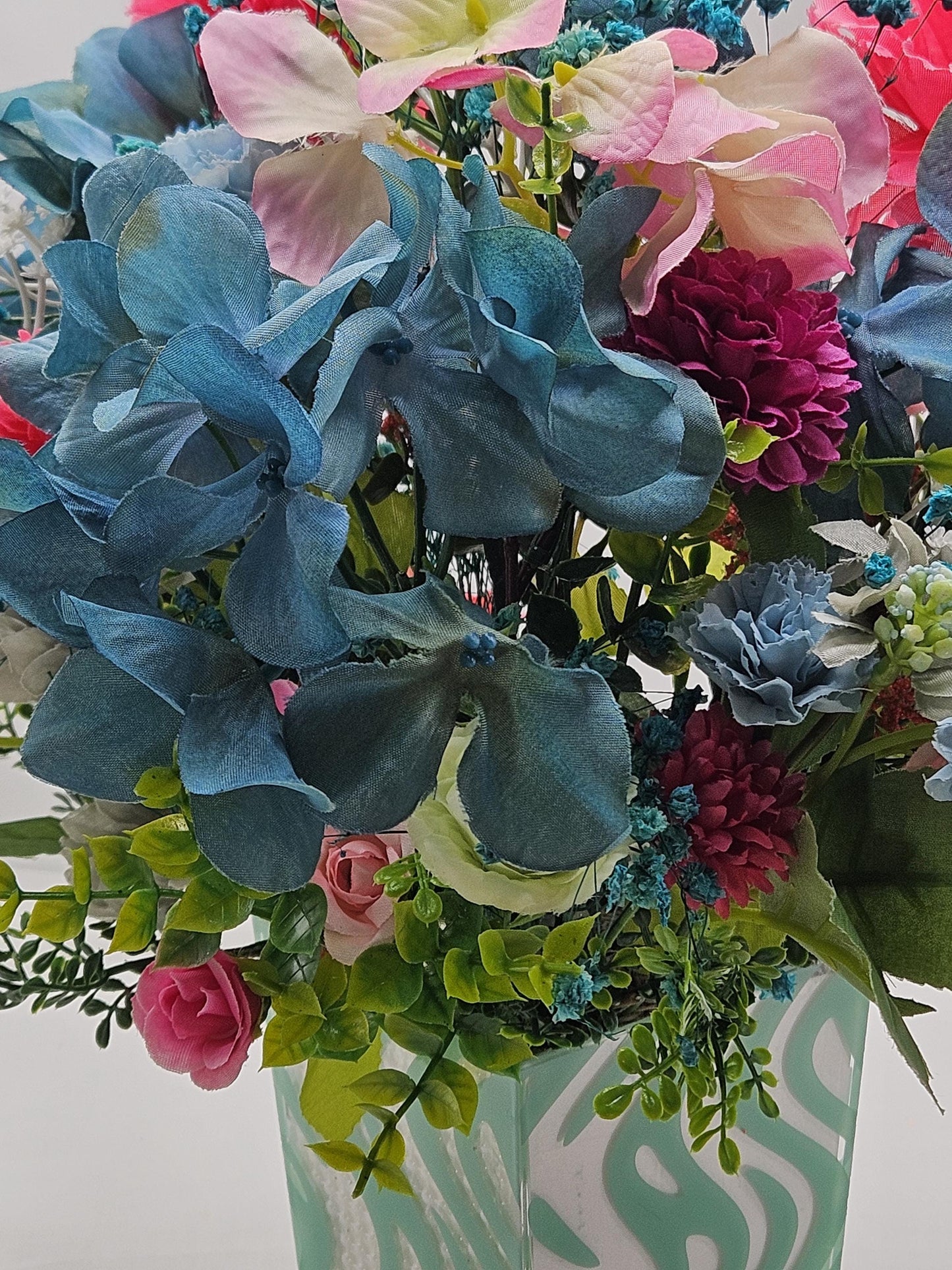 A Chilling Polar Bear Foral Centerpiece Set in Teal Striped Plastic Pot, Teal/Aqua/Pink Roses, Carnations/Other FloralsBaby's Breath