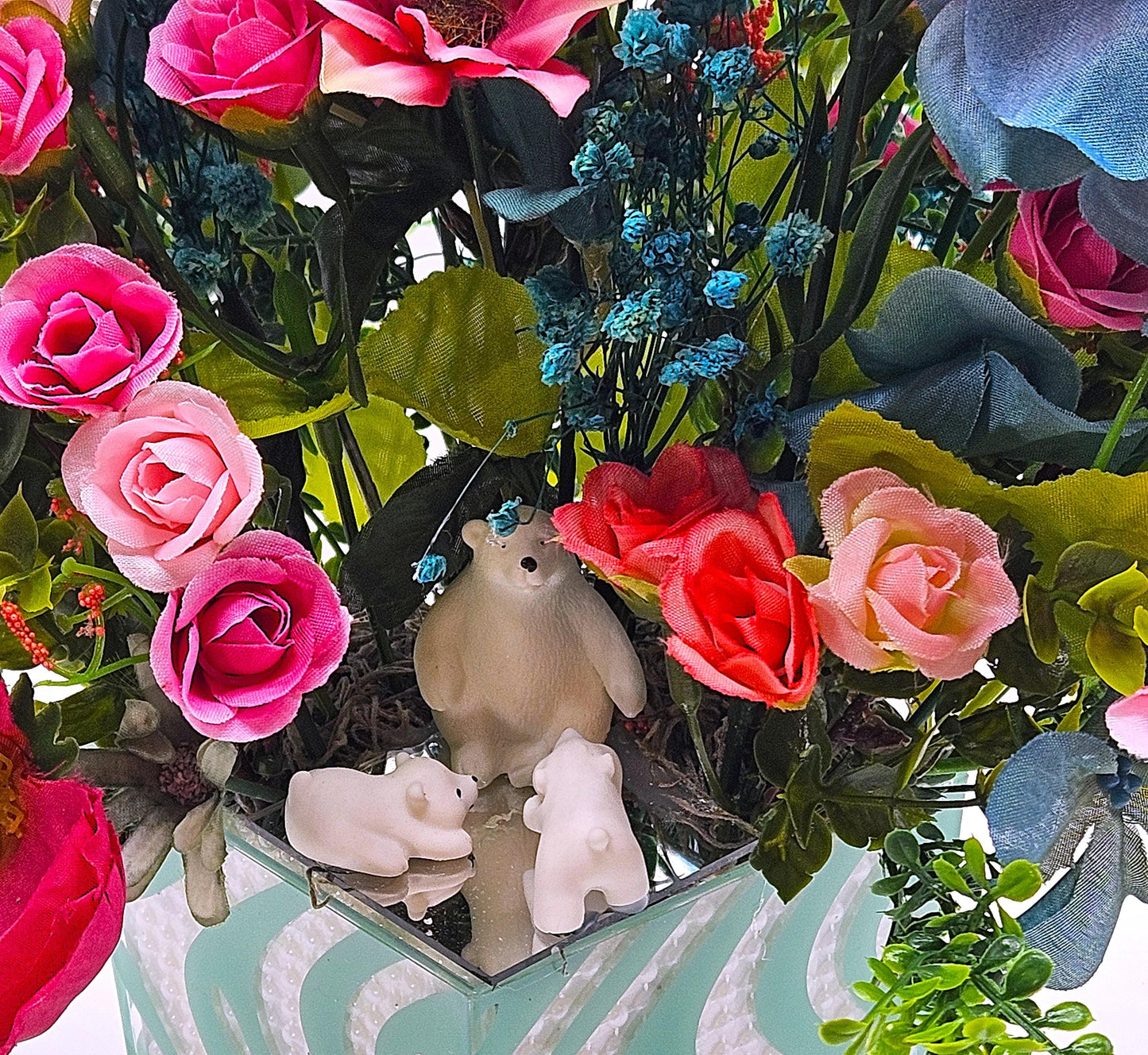 A Chilling Polar Bear Foral Centerpiece Set in Teal Striped Plastic Pot, Teal/Aqua/Pink Roses, Carnations/Other FloralsBaby's Breath