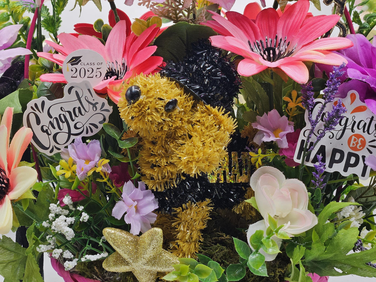 Whimsical Graduation Flower Arrangement in Pink Wicker Basket, Congrats and Enjoy Every Moment Signs with Pink/Purple Florals/Greenery