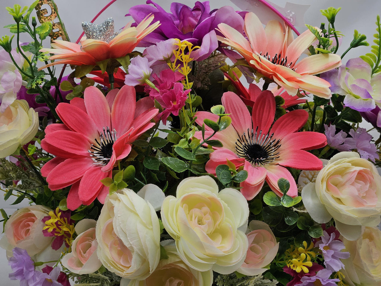 Whimsical Graduation Flower Arrangement in Pink Wicker Basket, Congrats and Enjoy Every Moment Signs with Pink/Purple Florals/Greenery