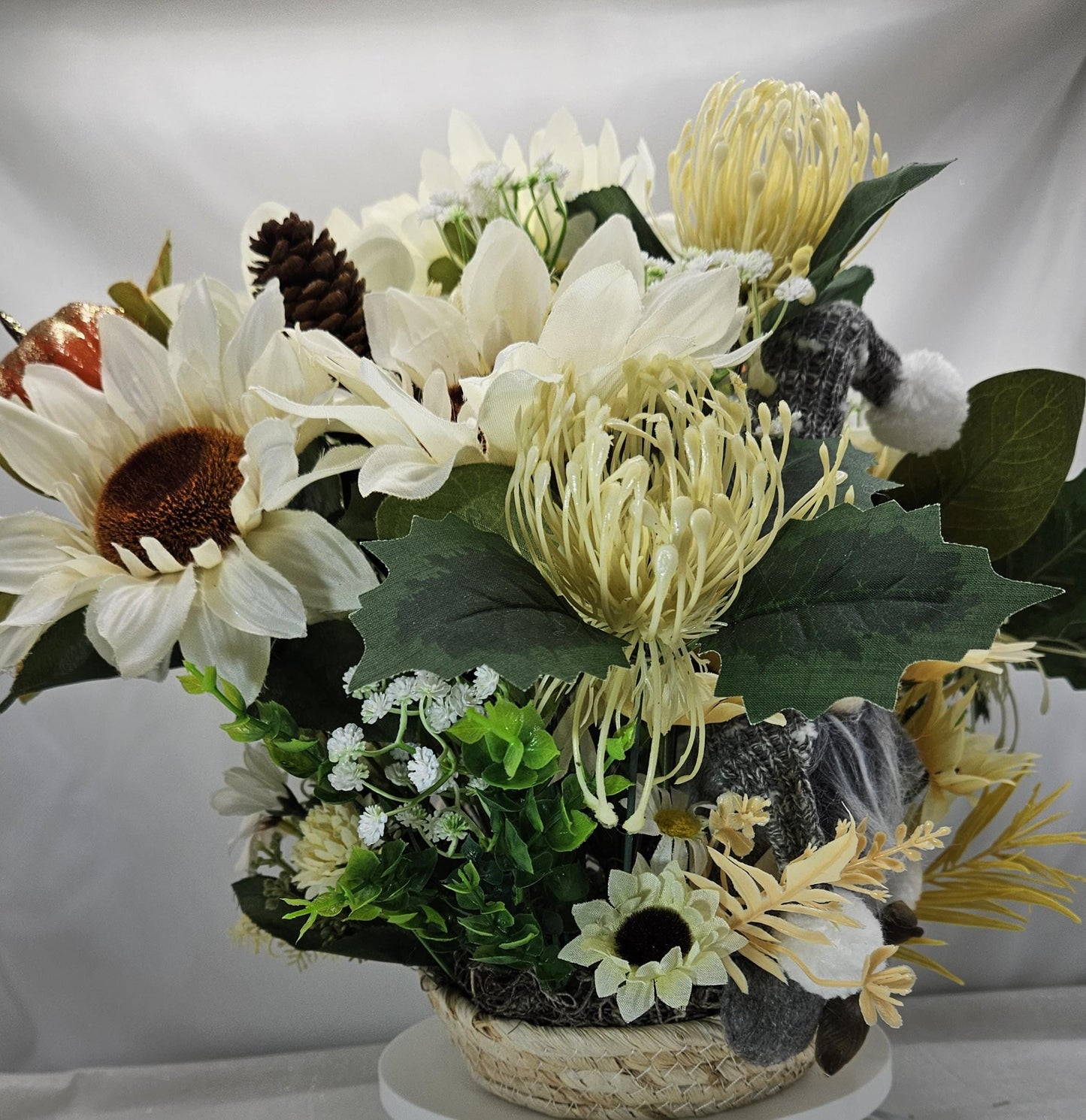 Cheerful Gray Gnome Sitting in Fall Garden of White Spider Mums/Sunflowers/Daisies/Pumpkinsa/Fall Leaves/Other Fall Accents/Woven Basket