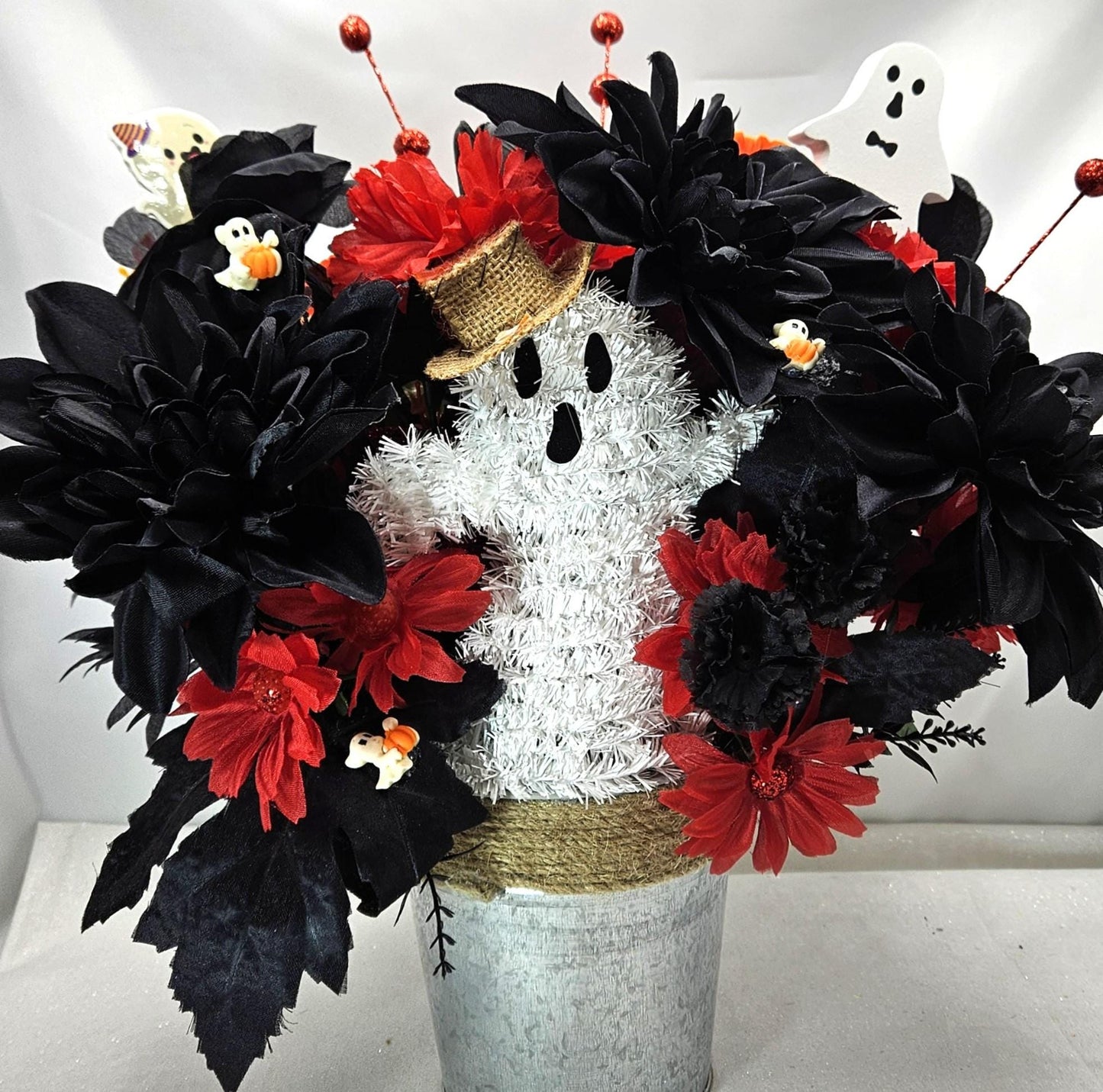 Halloween Floral Arrangement: Ghost, Black Dahlias, Red Daisies in Silver Tin
