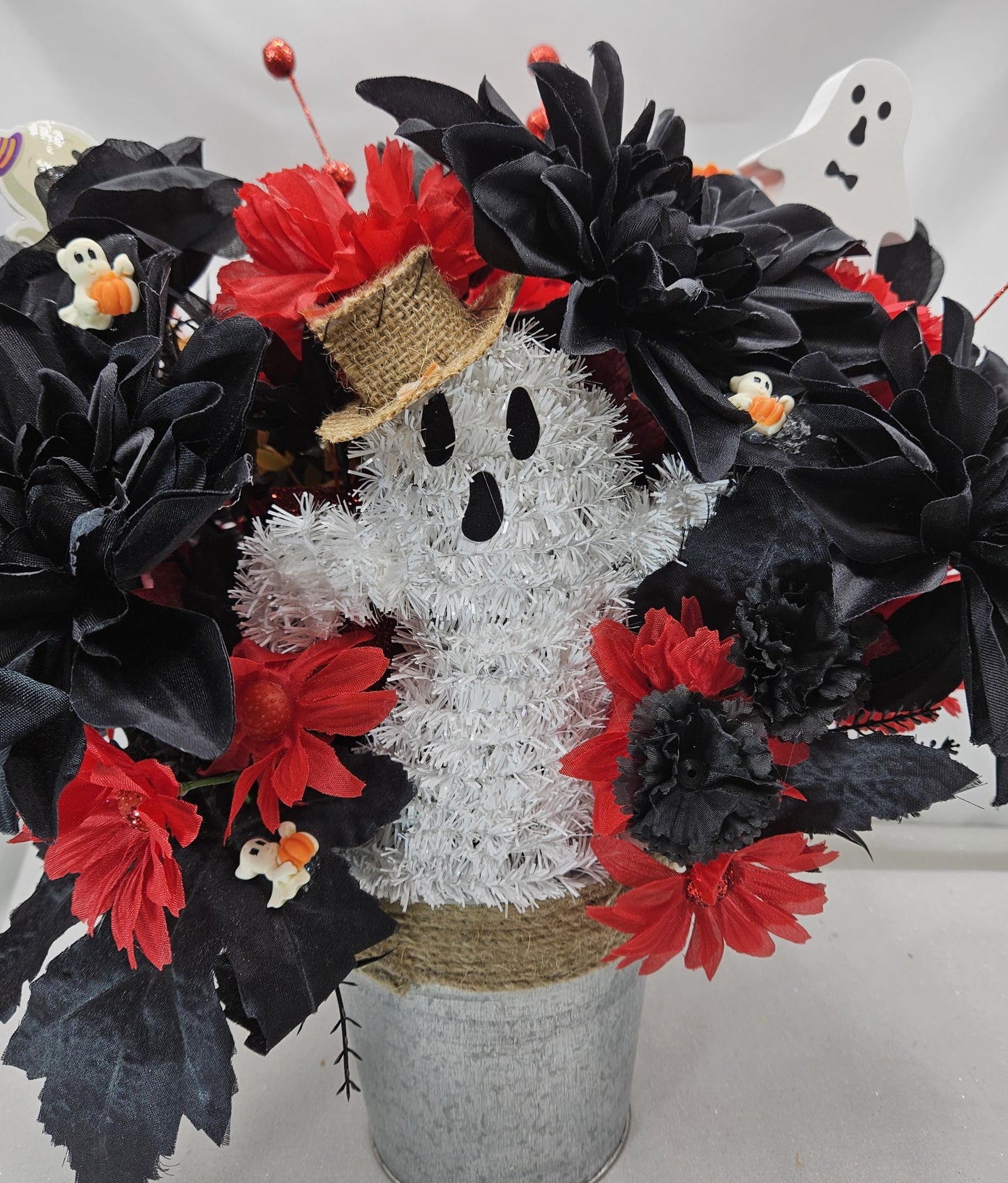Halloween Floral Arrangement: Ghost, Black Dahlias, Red Daisies in Silver Tin