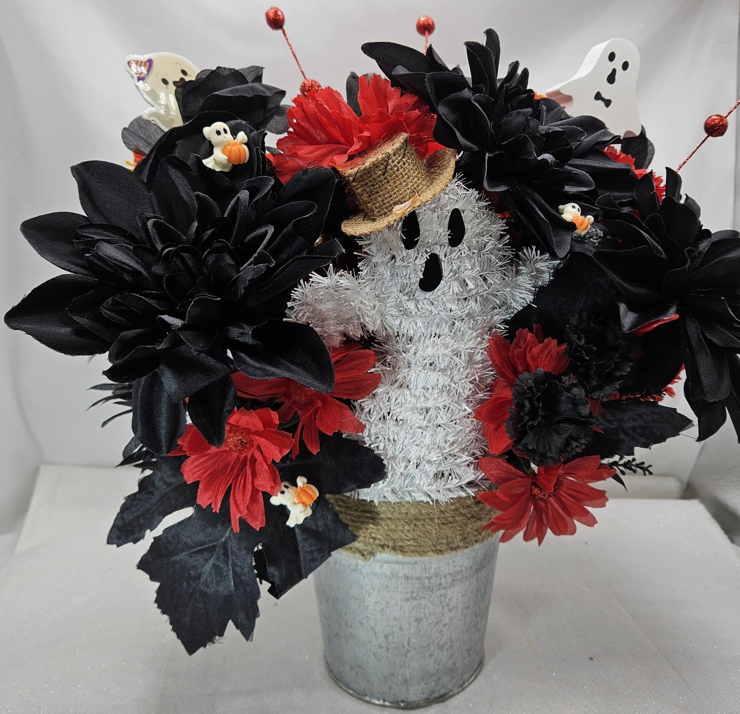 Halloween Floral Arrangement: Ghost, Black Dahlias, Red Daisies in Silver Tin