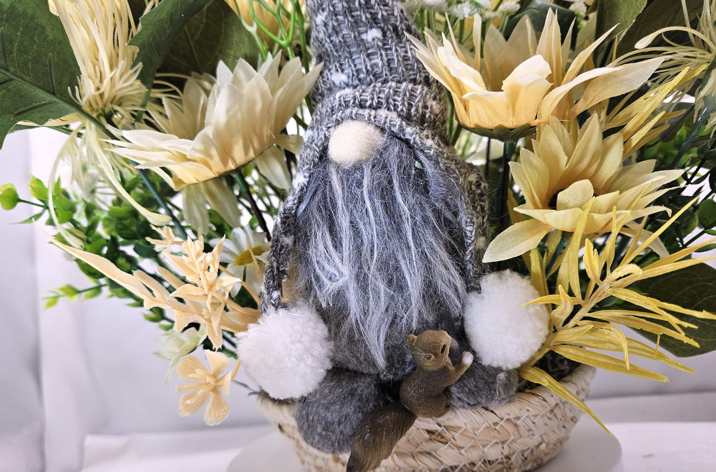 Cheerful Gray Gnome Sitting in Fall Garden of White Spider Mums/Sunflowers/Daisies/Pumpkinsa/Fall Leaves/Other Fall Accents/Woven Basket