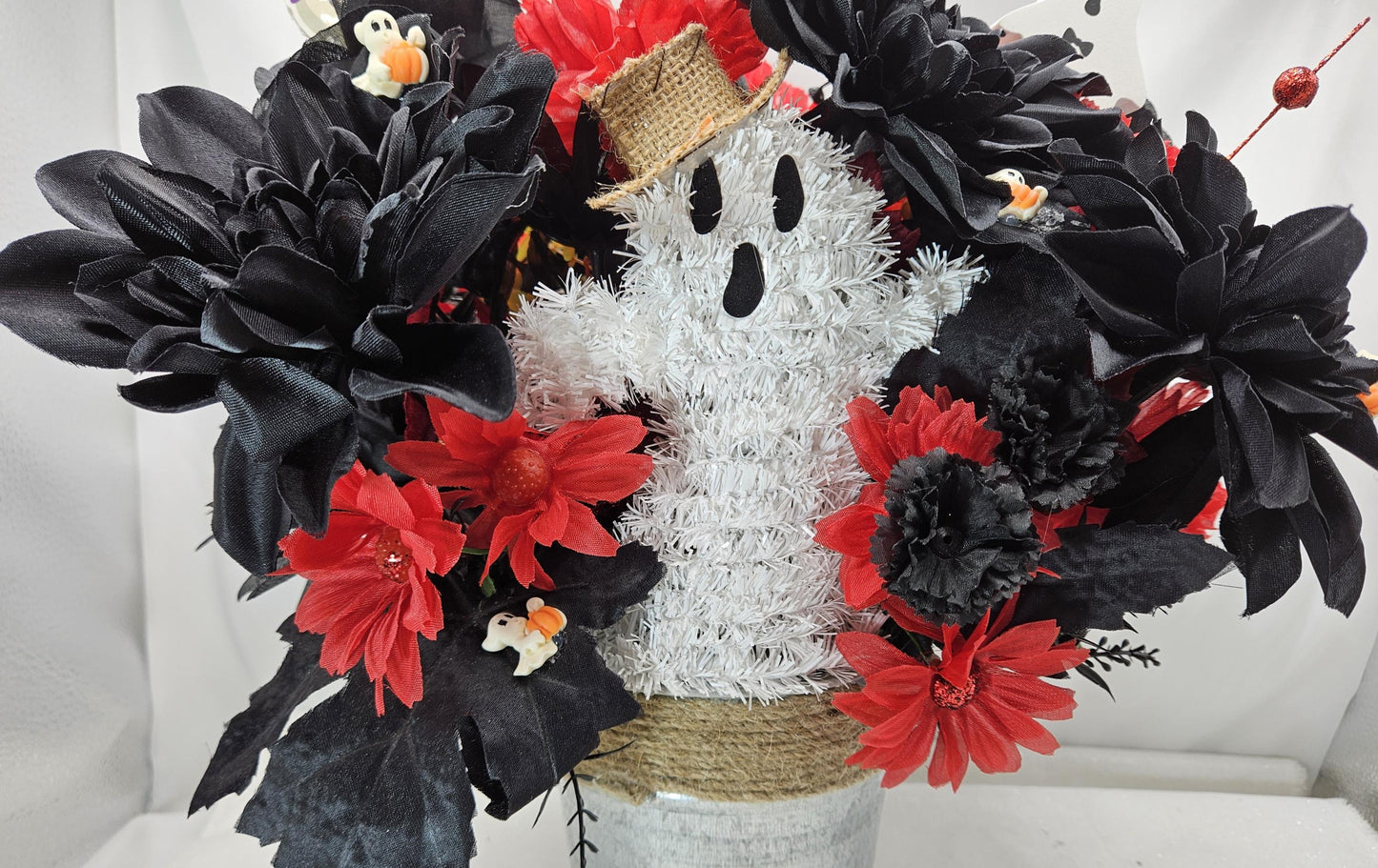 Halloween Floral Arrangement: Ghost, Black Dahlias, Red Daisies in Silver Tin