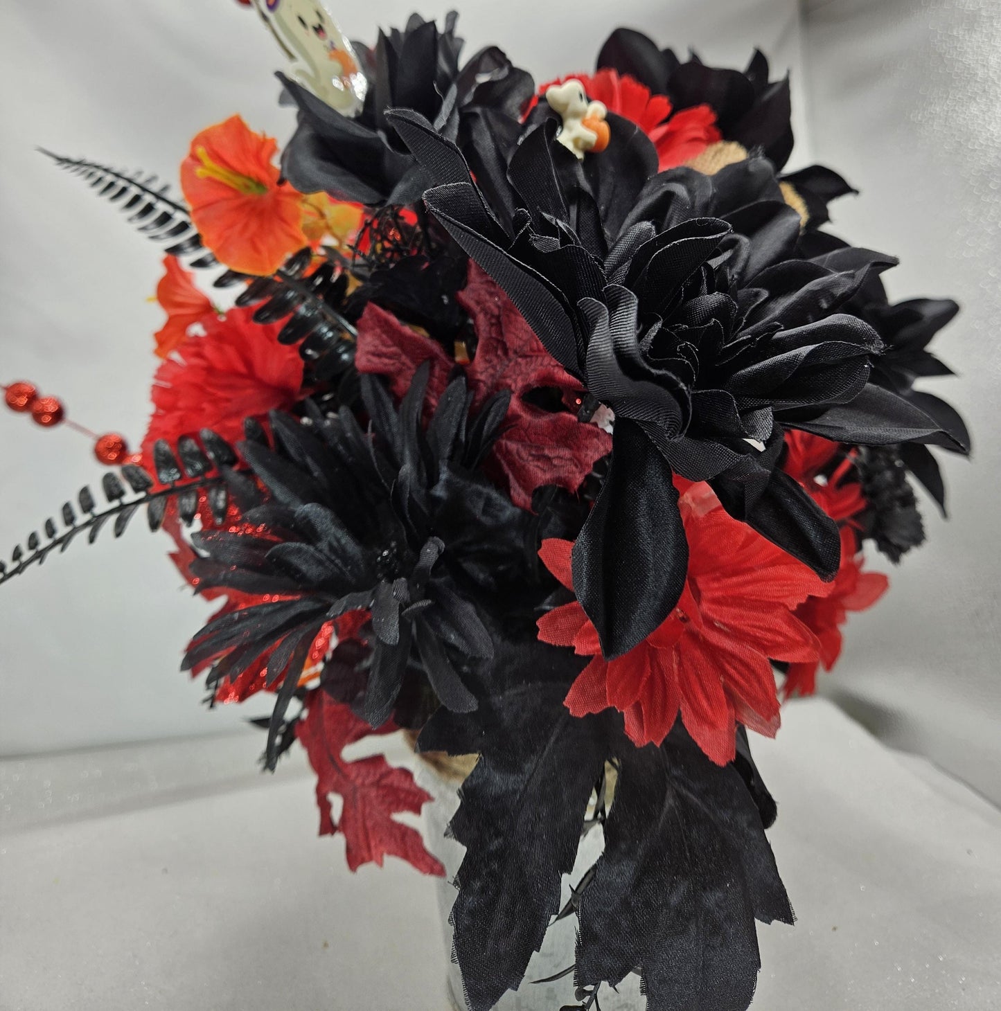 Halloween Floral Arrangement: Ghost, Black Dahlias, Red Daisies in Silver Tin